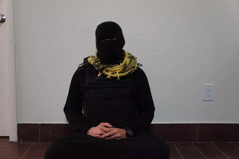 Image: Harlem Suarez waits to film an ISIS recruitment video at a Knights Inn in Homestead.