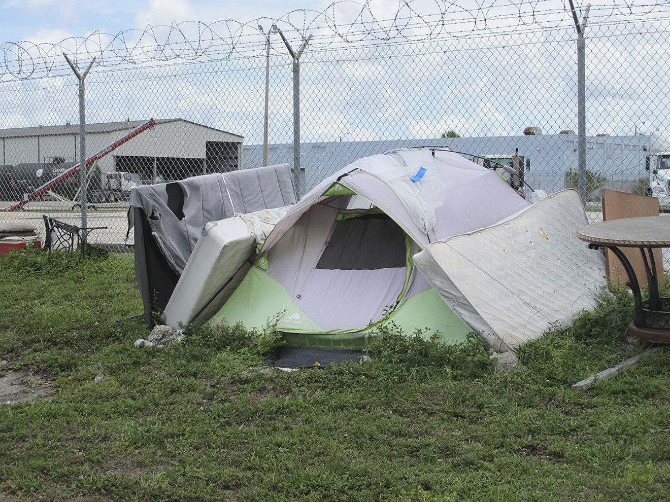 See more photos of life in the sex offender tent city near Hialeah. 