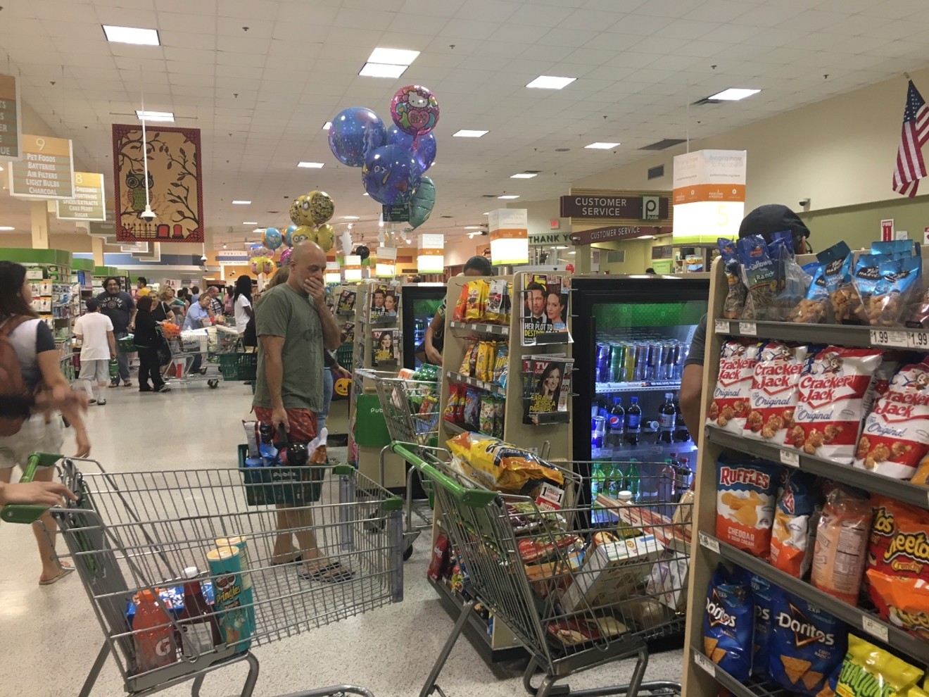 Shoppers purchase hurricane supplies at Publix.