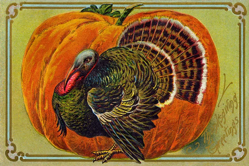 Image: Vintage gold-bordered Thanksgiving postcard showing a fully feathered turkey standing in front of a very large pumpkin. Written in shiny gold in the bottom-right corner: Thanksgiving Greetings