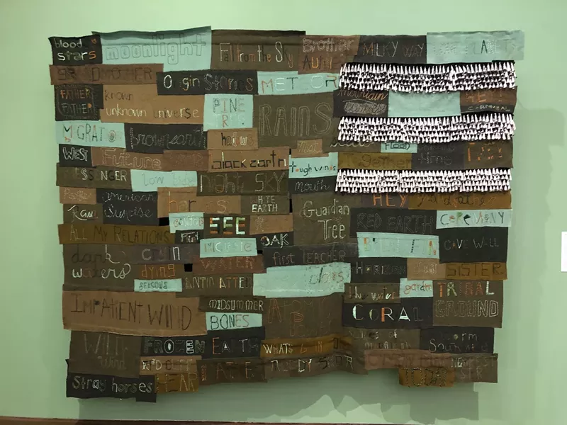 Image: Word etched and painted on wooden boards