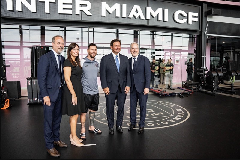 Gov. Ron DeSantis and Lieutenant Governor Jeanette Nuñez pose with superstar Lionel Messi and Inter Miami co-owners Jorge and Jose Mas at the club facility in Fort Lauderdale on August 8.