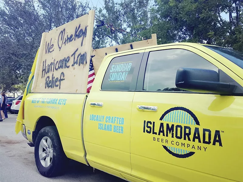 Image: Islamorada Beer Company co-workers have been driving a neon-yellow pickup around the Keys to help locals in need.