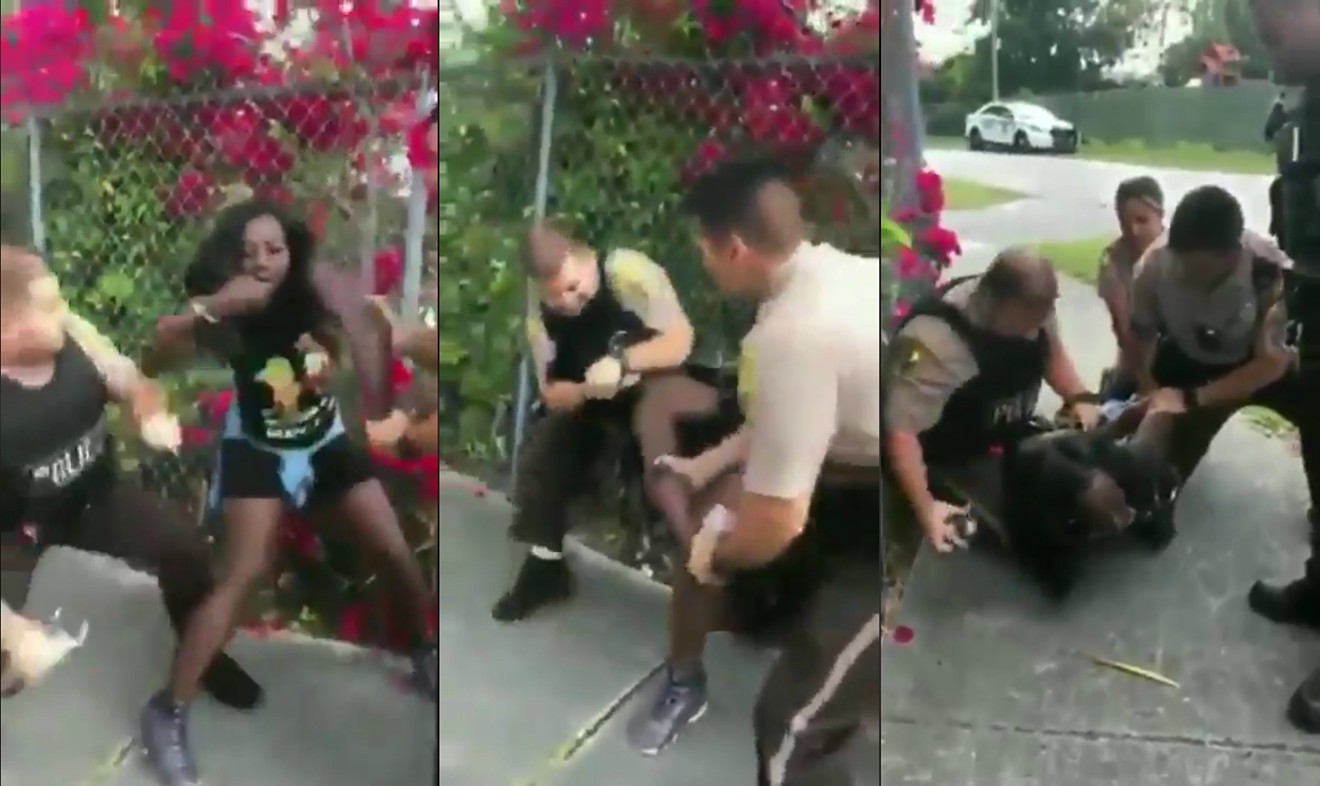 Miami-Dade police tussle with a woman in 2019 after she called to report being the victim of a crime.