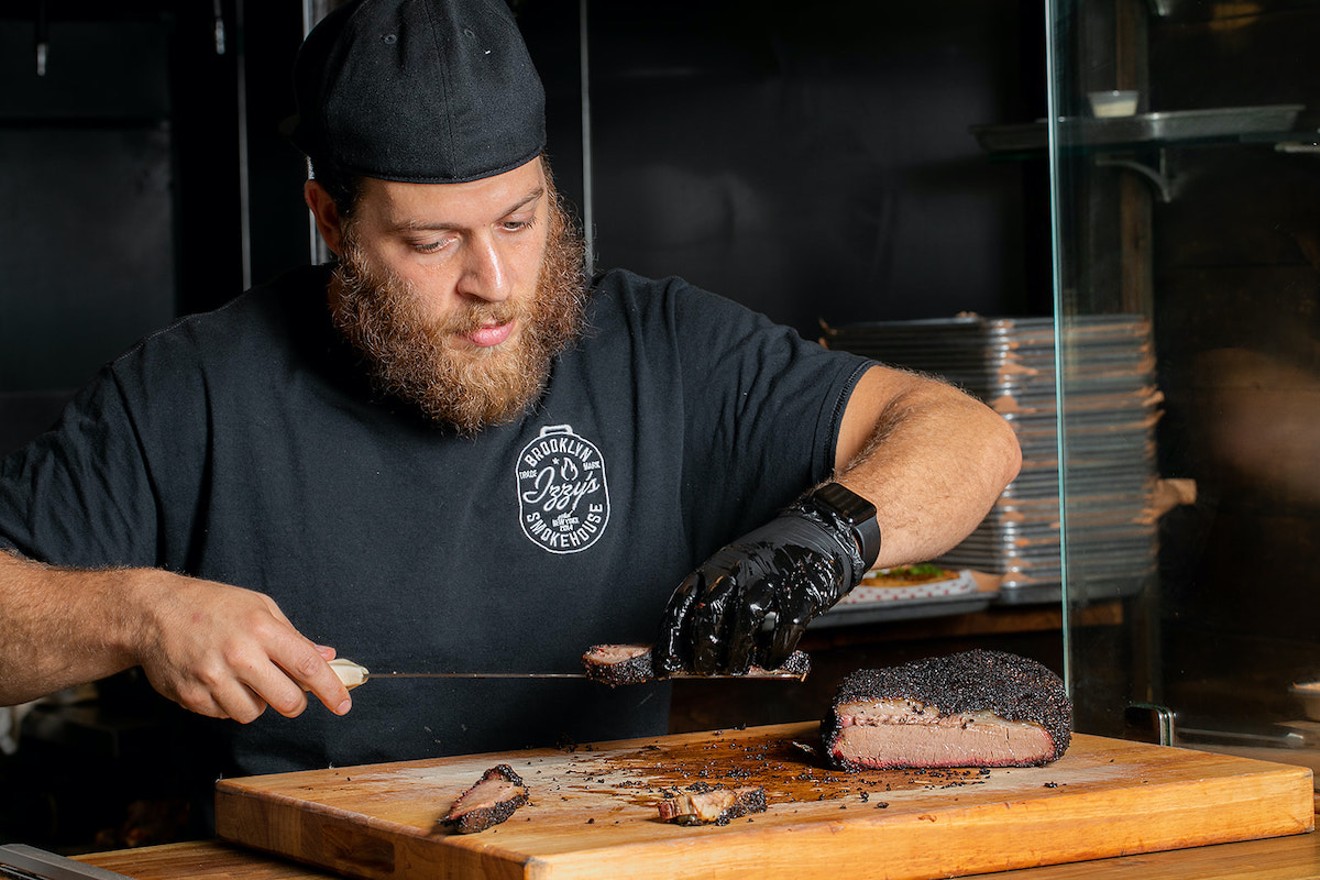 Izzy's Brooklyn Smokehouse founder and pit boss Sruli "Izzy" Eidelman is bringing his kosher concept to Miami.