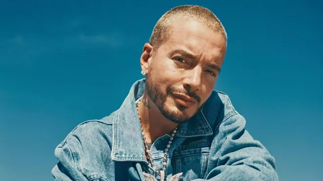 Portrait of a man posing wearing a denim jacket