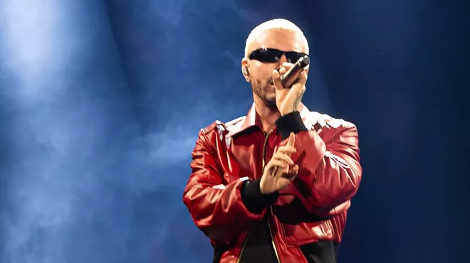 J Balvin performing on stage at the Kaseya Center in Miami