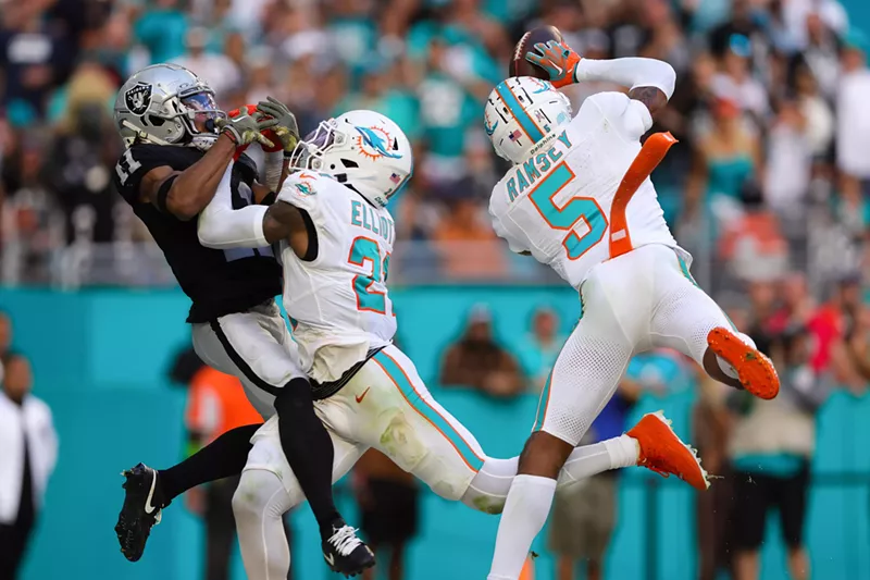 Image: Jalen Ramsey intercepts a pass during the fourth quarter in a game against the Las Vegas Raiders at Hard Rock Stadium on November 19, 2023.