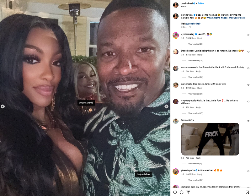 Image: Porsha Williams poses for a selfie with Jamie Foxx, who wears a tropical print shirt, while Phaedra Parks smiles in the background at Miami’s Prime 112.