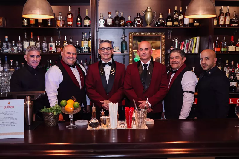 Image: Julio Cabrera (center, in eyeglasses) and his staff at Cafe la Trova.