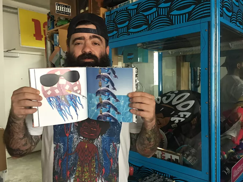 Image: At his studio, Ahol Sniffs Glue gives a sneak preview of his book.