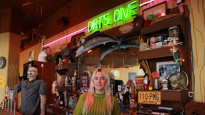 Kelly Breez in front of her art installation, Dirt's Dive
