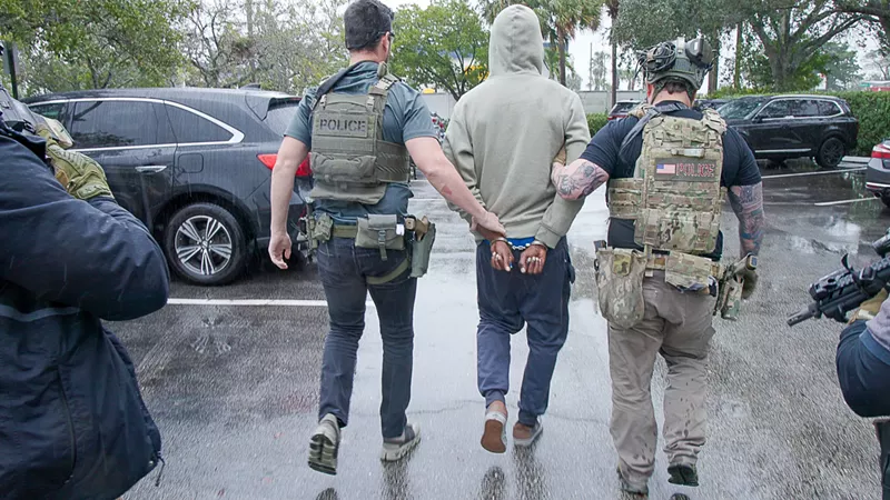 Image: ICE agents arrest a man in Boynton Beach in January 2025.