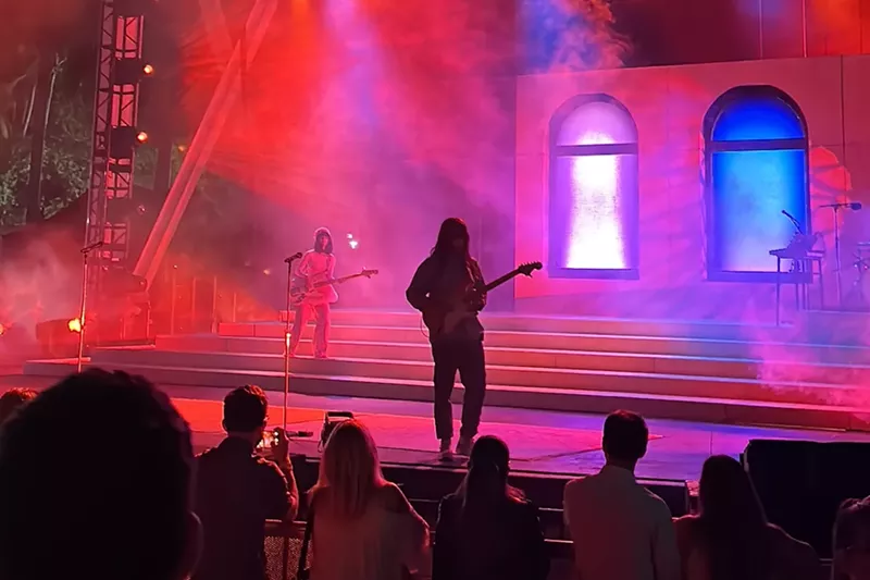Image: Khruangbin performing onstage in Miami