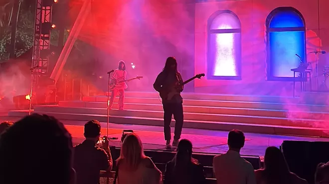 Khruangbin performing onstage in Miami