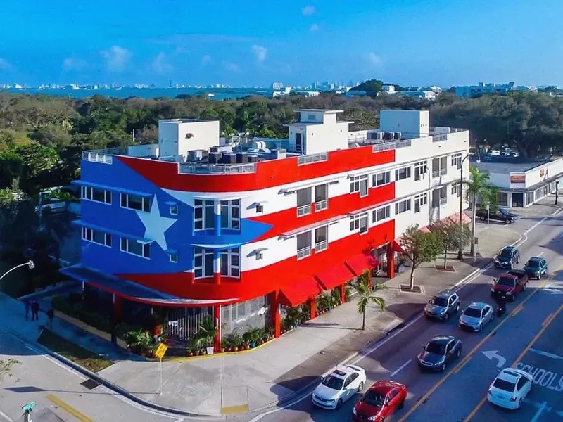 Image: La Placita's flag mural is in jeopardy.