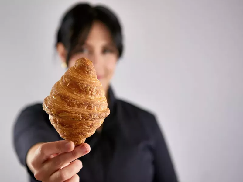 Image: Carolina Molea and her famous croissant.