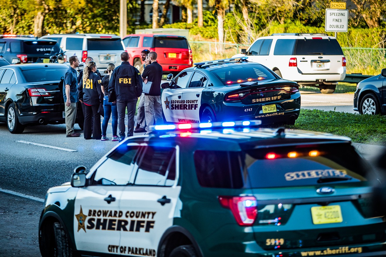 Police respond to the mass shooting at Marjory Stoneman Douglas High School in Parkland.