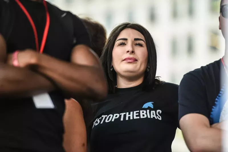 Image: Laura Loomer, a far-right internet personality, calls herself "the most banned woman in the world."