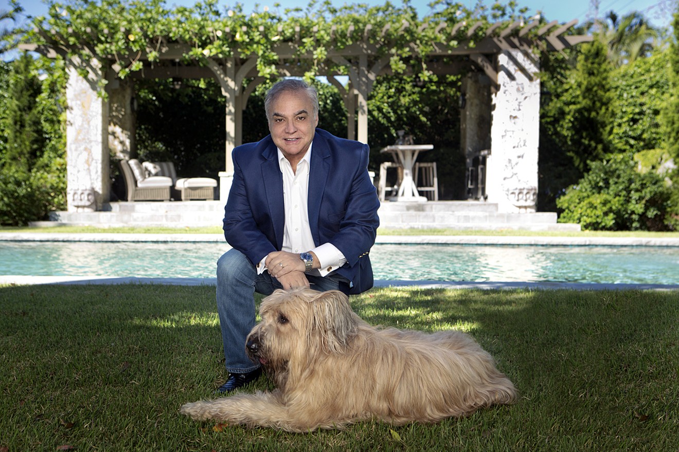 South Beach Wine and Food Festival founder Lee Schrager and his dog at home in Coral Gables