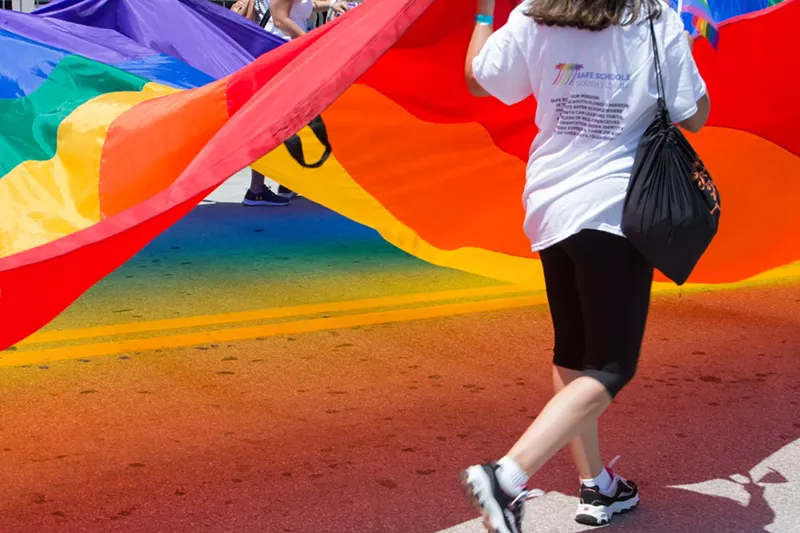 Image: A rainbow flag in the Miami Beach Pride Parade in April 2019.