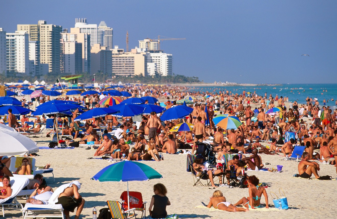 Crowds sunbathing in Miami Beach.