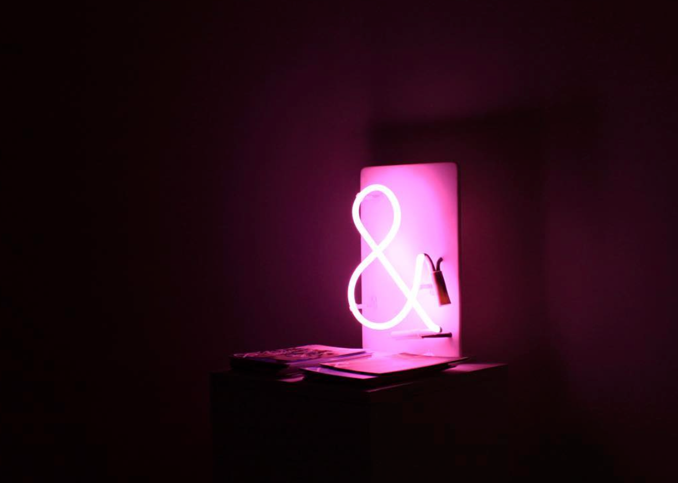 &gallery's glowing ampersand.