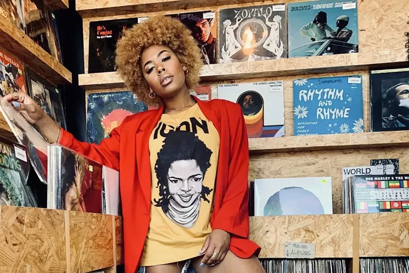 Image: A model wears the Lauryn Hill icon shirt.