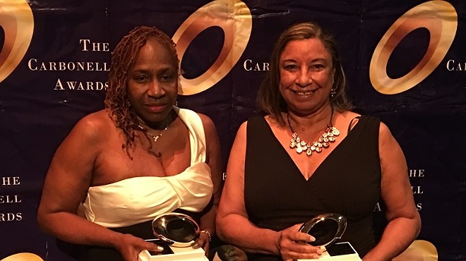 Patricia E. Williams and Shirley Richardson posing with their Carbonell trophies in hand