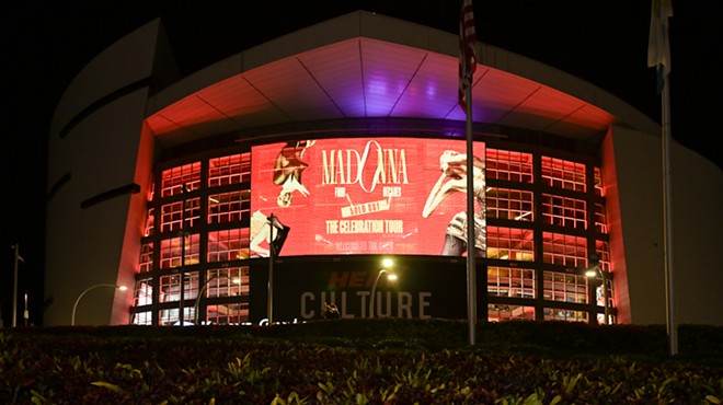 Kaseya Center with an LED display promoting the Madonna concert