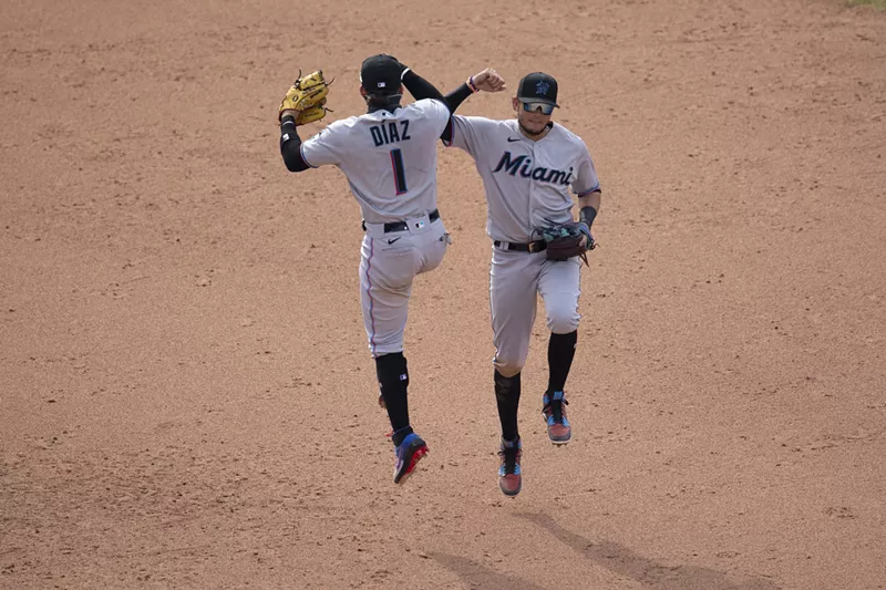 Image: Isan Diaz and Miguel Rojas of the Miami Marlins celebrate their win against the Philadelphia Phillies.