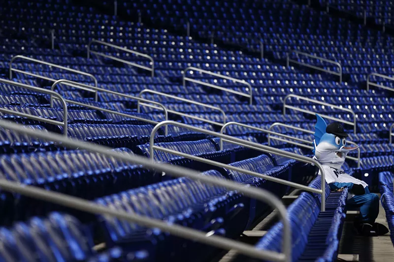Image: Billy the Marlin looks on from the empty stands during the fifth inning between the Miami Marlins and the Atlanta Braves at Marlins Park on August 16, 2020.