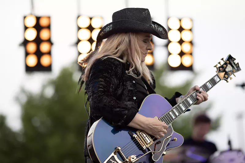 Image: Melissa Etheridge performing on stage