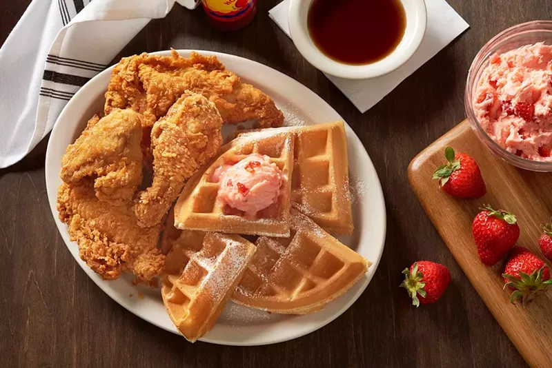 Image: Metro Diner's chicken and waffle platter served with strawberry butter.