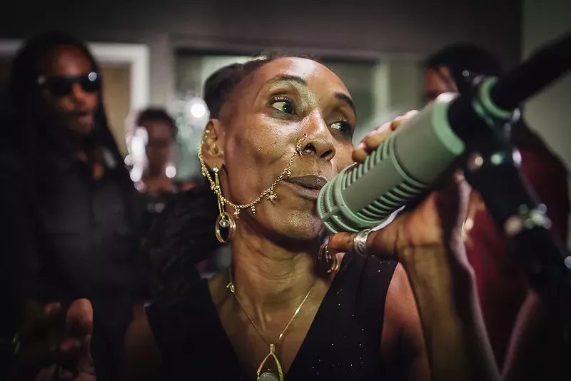 Image: Ajhanou Uneek performing amongst her community.