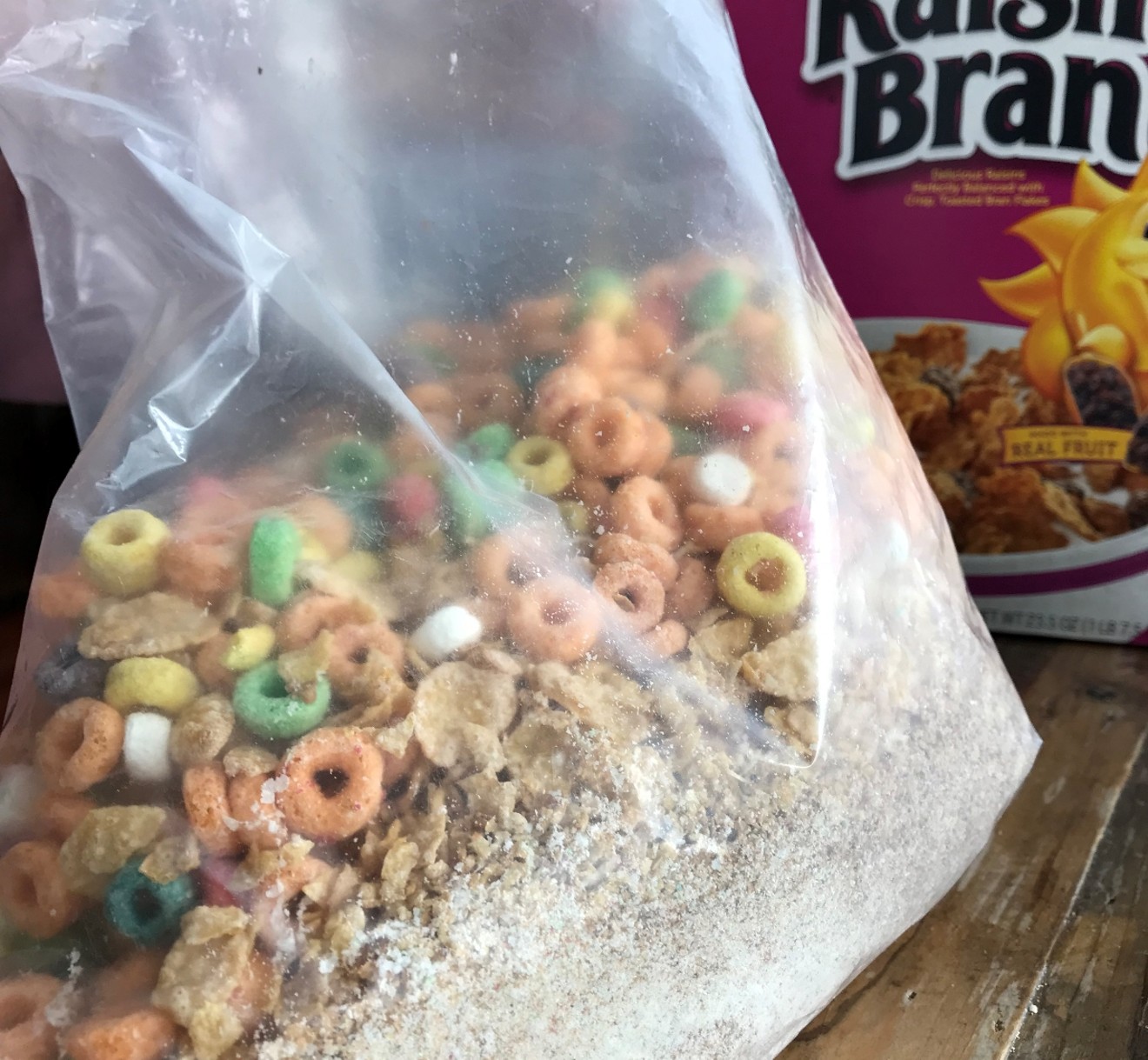 Mystery cereal mixture inside sealed Raisin Bran box.