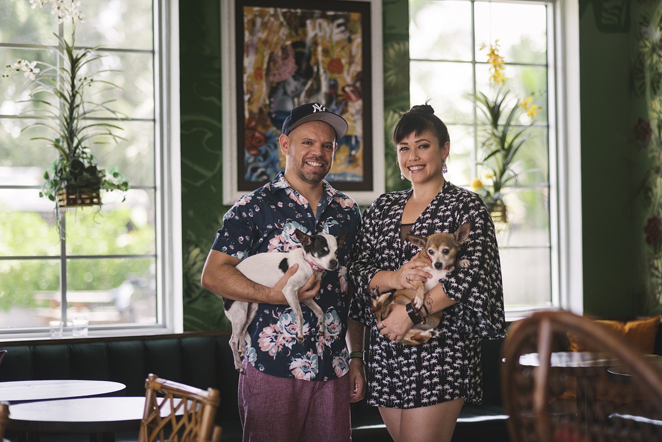 Phuc Yea's Cesar Zapata and Aniece Meinhold with Sophia and Lola. View more photos of chefs and their dogs here.