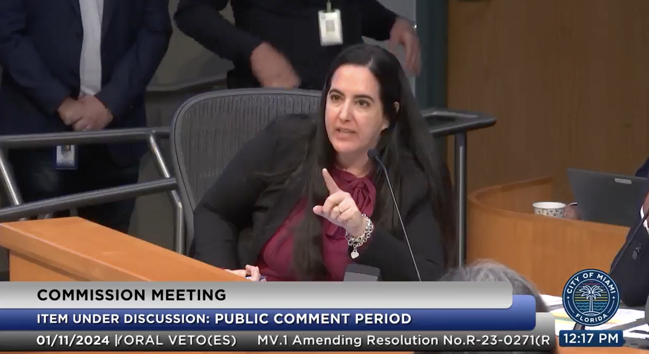 At the Miami commission meeting on January 11, city attorney Vicky Méndez responds to film director Billy Corben after he spoke during the public comment period.