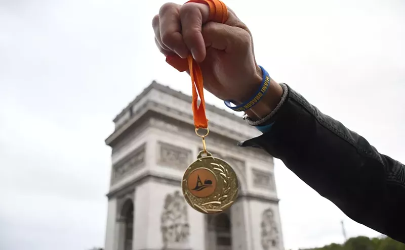 Image: Miami Crew Braves Wind, Chill, and Rain to Win La TraverSeine Dragon Boat Race in Paris