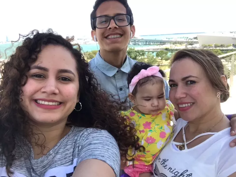 Image: Mabel Perez-Ordonez (right) and her three children (from left), 21-year-old Tatiana Arauz-Perez, 15-year-old Jonathan Arauz-Perez, and 18-month-old Janice Hidalgo-Perez