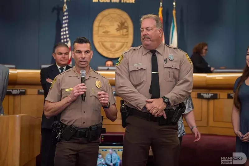 Image: Miami-Dade County Police Director Juan Perez (left)