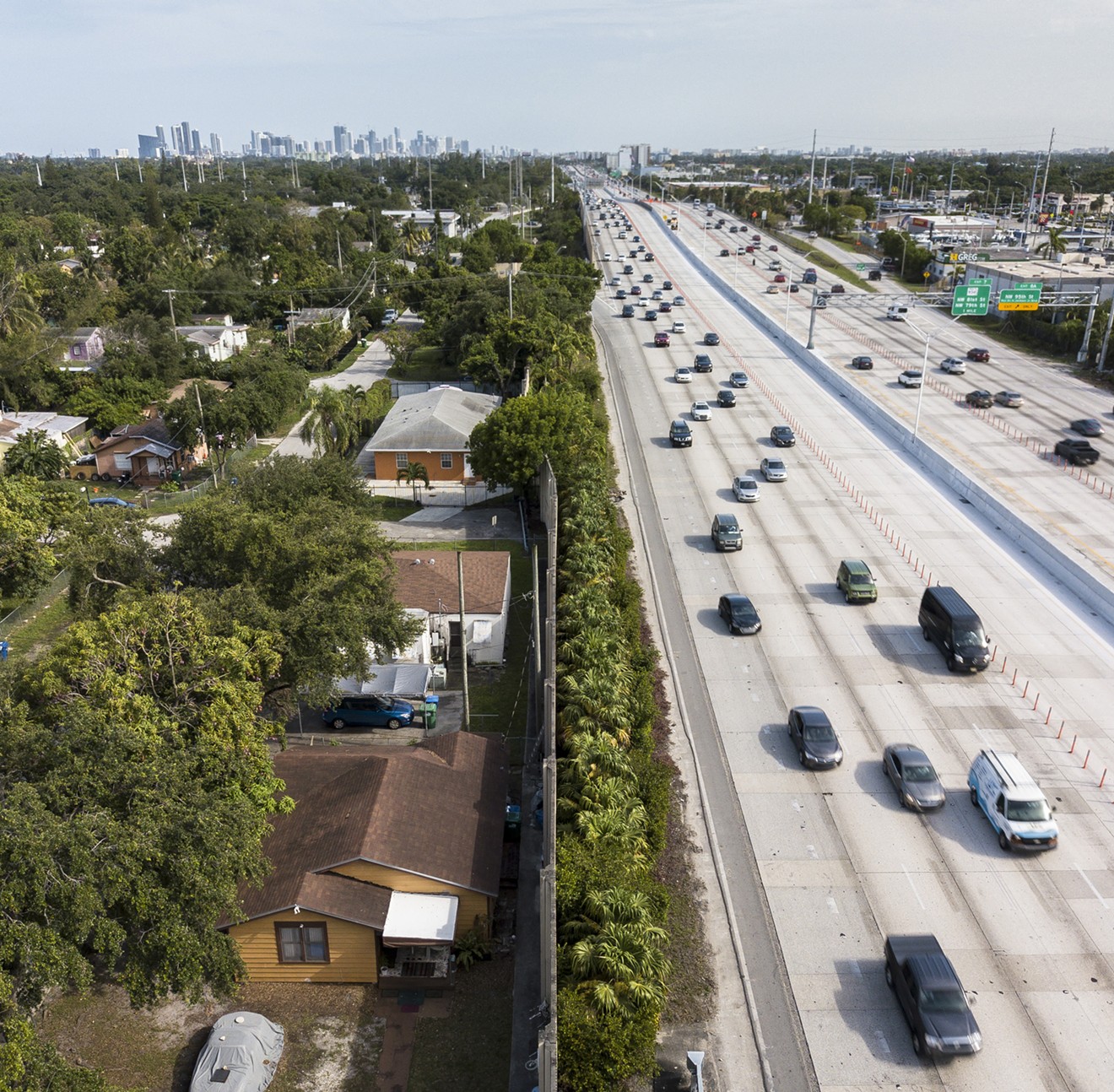 An aerial photo shows the proximity of Interstate 95 to homes along NW Sixth Avenue.