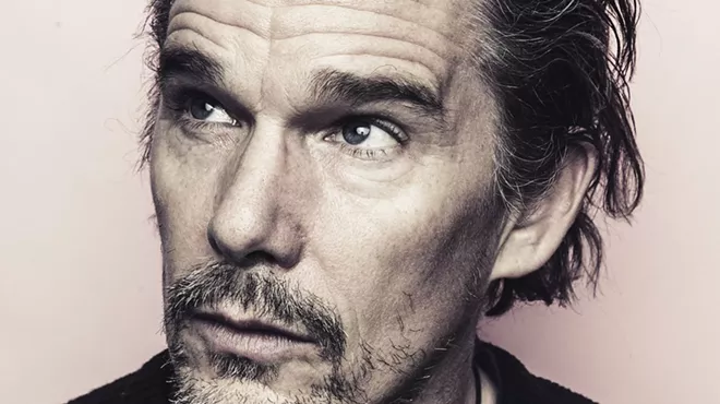 close-up sepia-toned headshot of actor Ethan Hawke