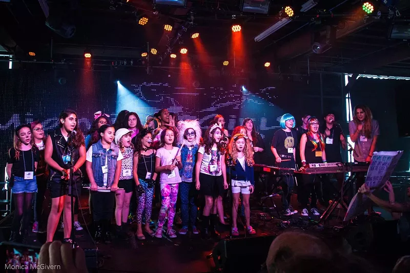 Image: Young camper of Miami Girls Rock Camp on stage