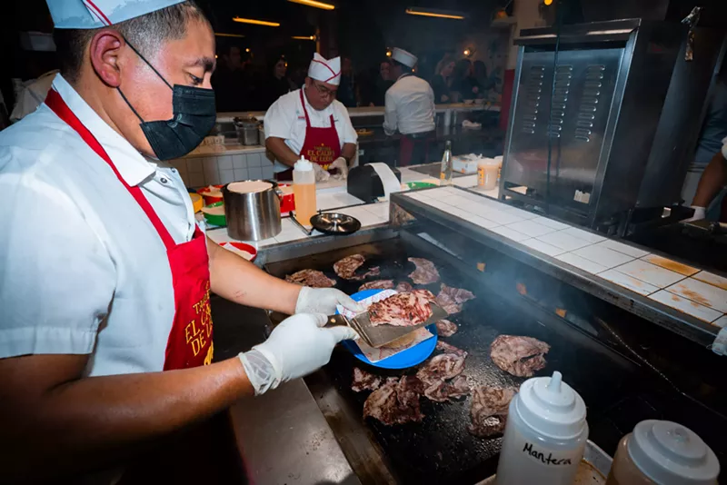 Image: a man and tacos