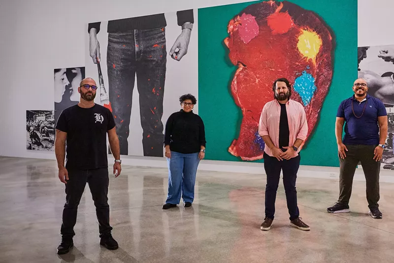Image: Marco Ramirez, Carmen Pelaez, Michel Hausmann, and Aurin Squire standing in a gallery at the Rubell Museum