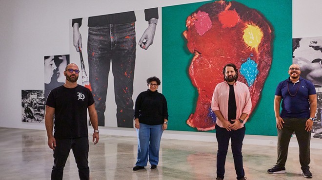 Marco Ramirez, Carmen Pelaez, Michel Hausmann, and Aurin Squire standing in a gallery at the Rubell Museum