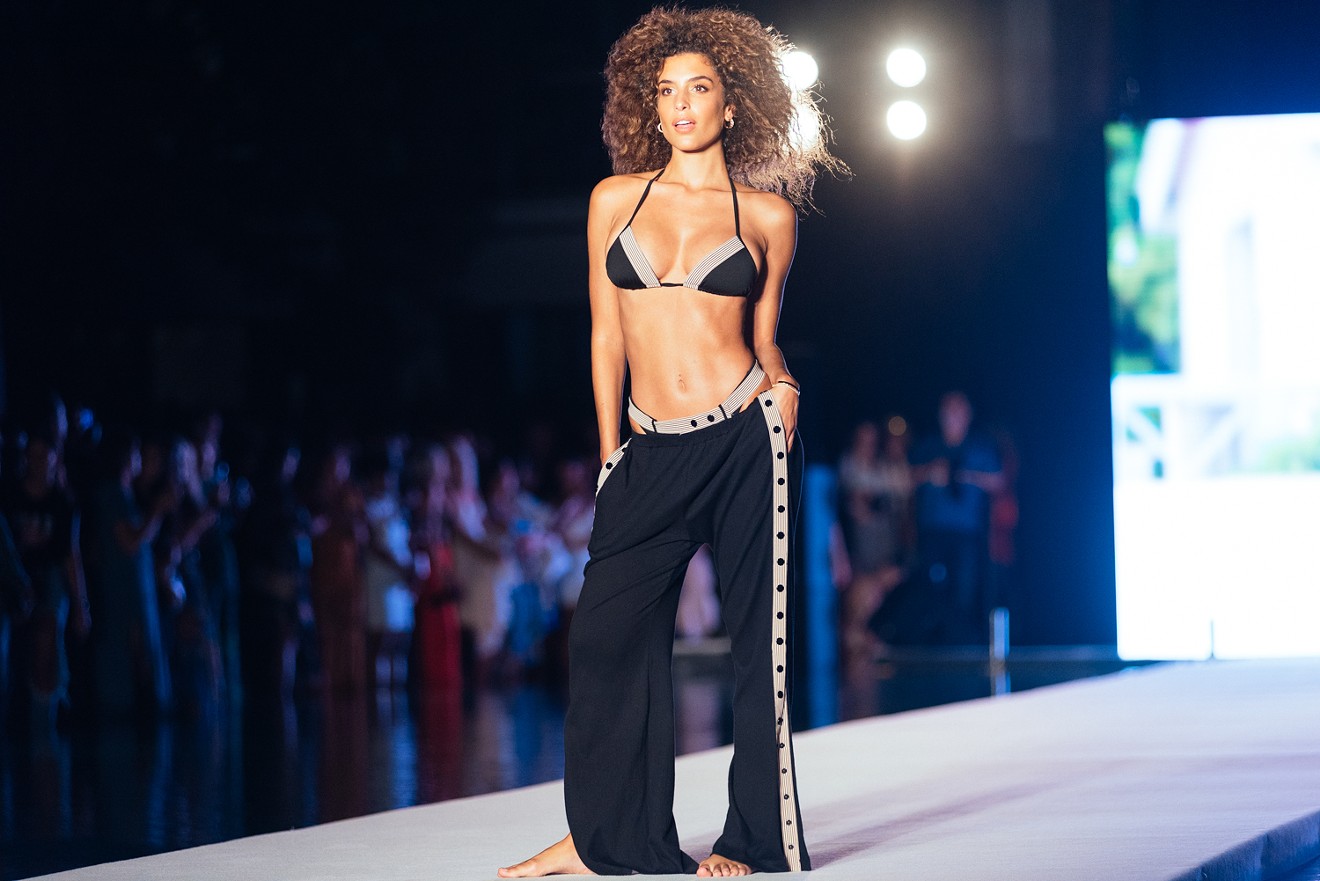 A model walks the runway at last year's Miami Swim Week.