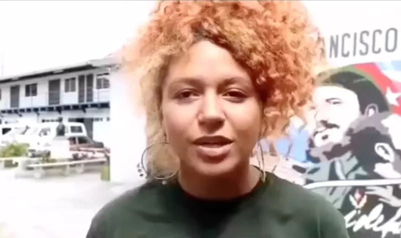 Image: Helen Peña speaks during her trip to Venezuela in February 2020 in an interview posted by Venezuela's foreign ministry.