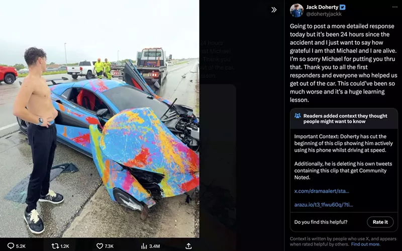 Image: Jack Doherty stands shirtless next to his wrecked McLaren
